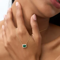 14k 1.00 Ctw Octagon Emerald in Diamond Halo Setting