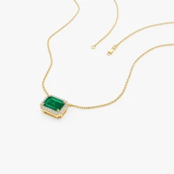14k 1.00 Ctw Octagon Emerald in Diamond Halo Setting