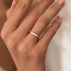 14k Beaded Three Stone Diamond Ring