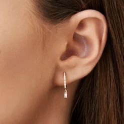 14k Diamond Huggies with a Dangling Baguette Diamond