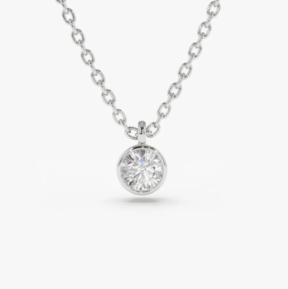 14K Gold Diamond Solitaire on a Bail