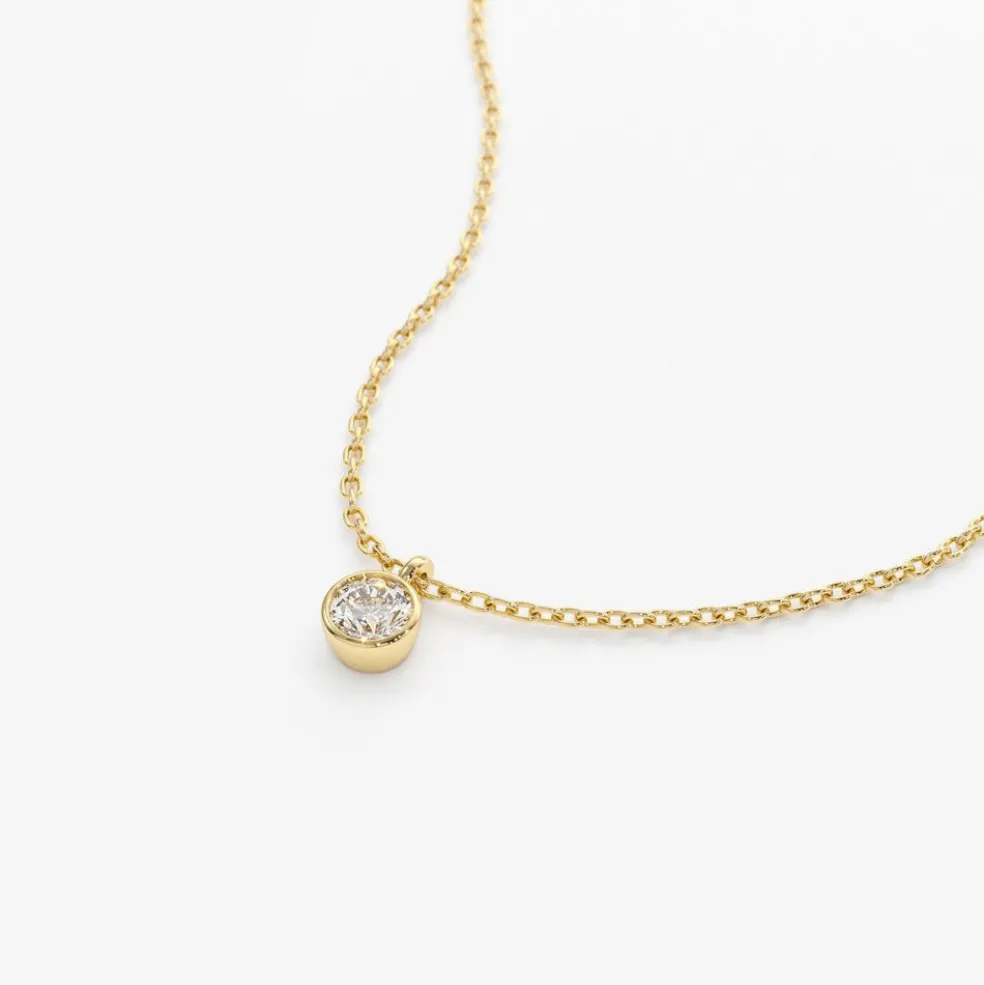 14K Gold Diamond Solitaire on a Bail