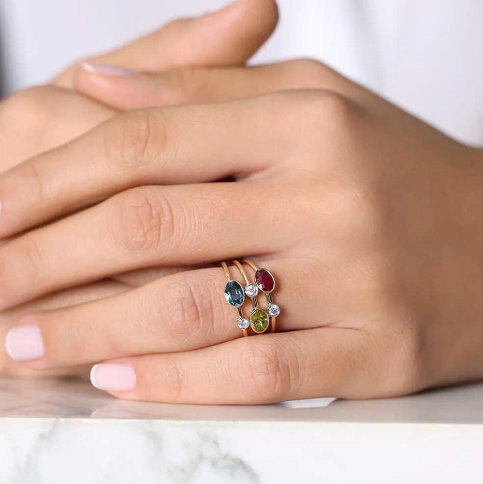 14k Gold Oval London Blue Topaz and Diamond Ring