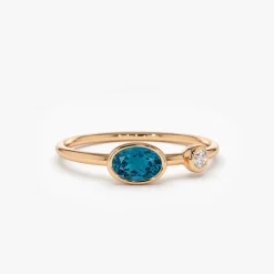 14k Gold Oval London Blue Topaz and Diamond Ring
