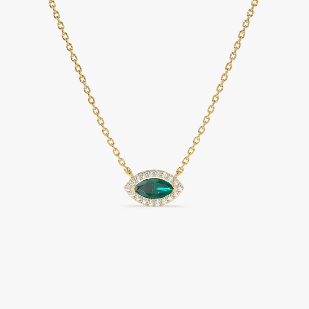 14k Marquise Emerald with Halo Diamond Setting