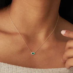 14k Marquise Emerald with Halo Diamond Setting