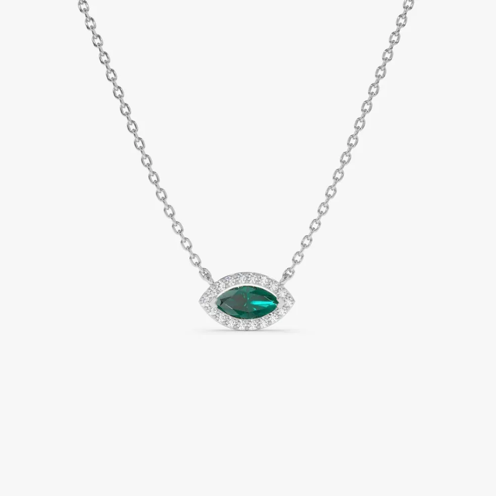 14k Marquise Emerald with Halo Diamond Setting