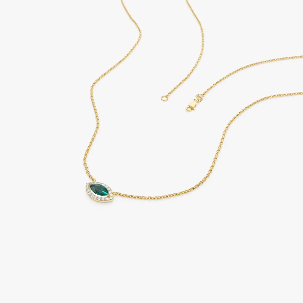 14k Marquise Emerald with Halo Diamond Setting