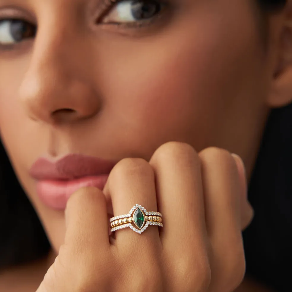 14k Marquise Shaped Emerald Ring with Nesting Diamond Bands