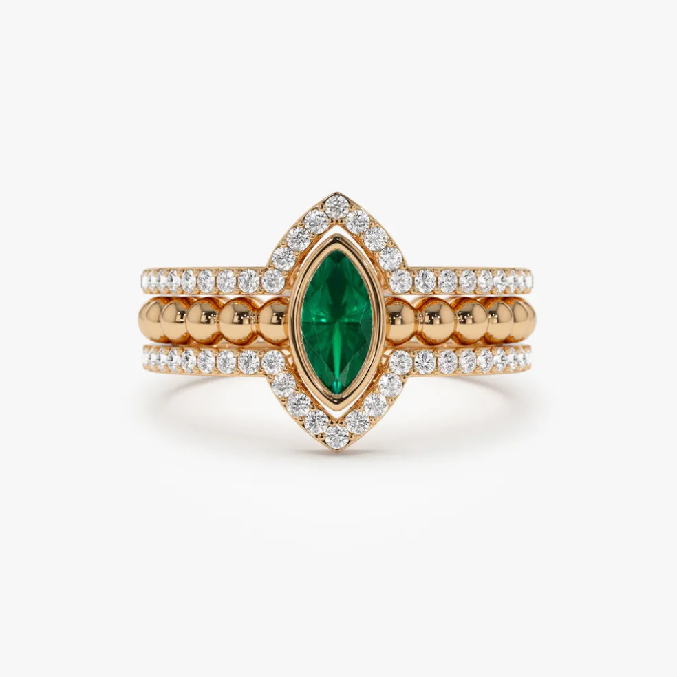 14k Marquise Shaped Emerald Ring with Nesting Diamond Bands