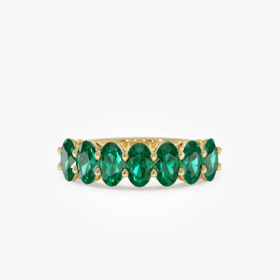 14k Oval Shaped Basket Setting Emerald Ring